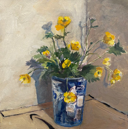 Buttercups in yoghurt pot
