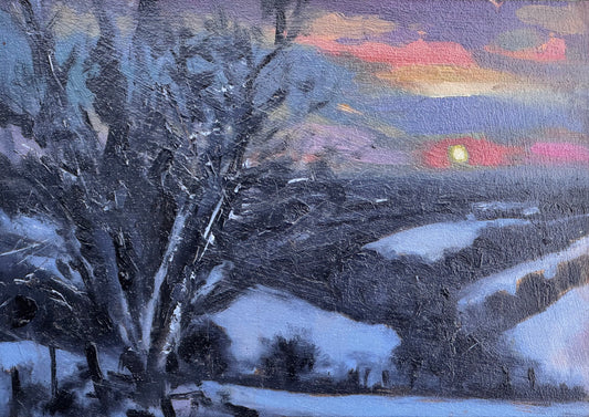 Sun setting, frosty fields